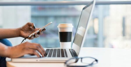 Free laptop on table top stock photo