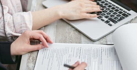 a-person-typing-on-laptop