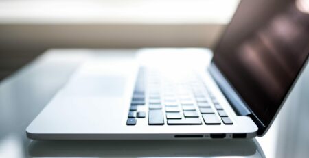 shallow-focus-photography-of-macbook