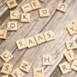 scrabble-letters-spelling-saas-on-a-wooden-tabl